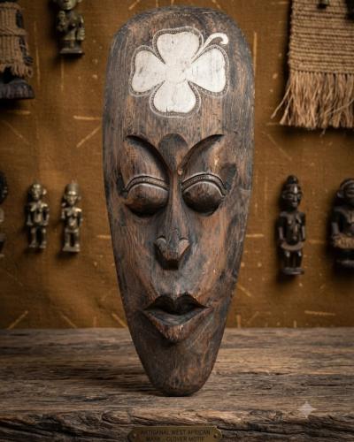 Artisanal West African Hand-Carved Wood Mask - Four-Leaf Clover Motif