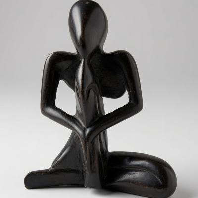 Abstract Black Wooden Seated Figure Sculpture – Modern African Art